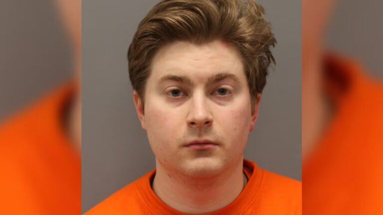 Back-Alexander-Saine-Mugshot